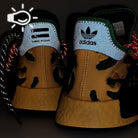 adidas Pharrell Williams x adidas HU NMD Pulamb / Bogold / Core Black Sneakers  Detailfoto | Overkill