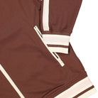 New Balance Athletics 70s Run Track Jacket Rich Oak Track Jackets Detailfoto | Overkill