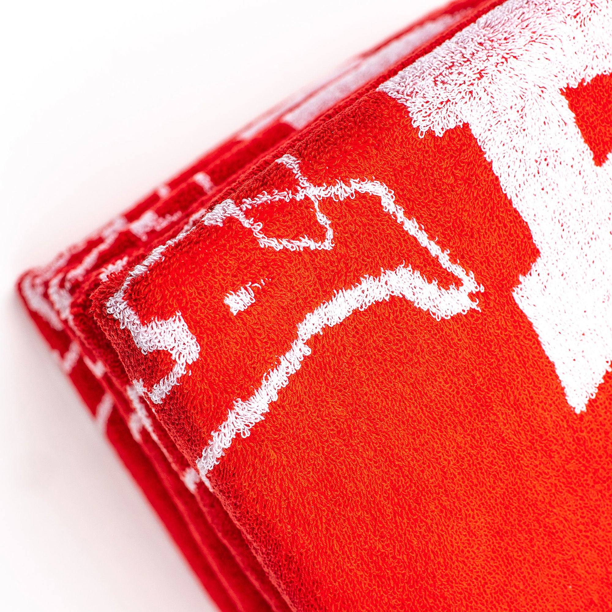 Montana Beach Towel Typo + Logo Red Towels Close-up | Overkill