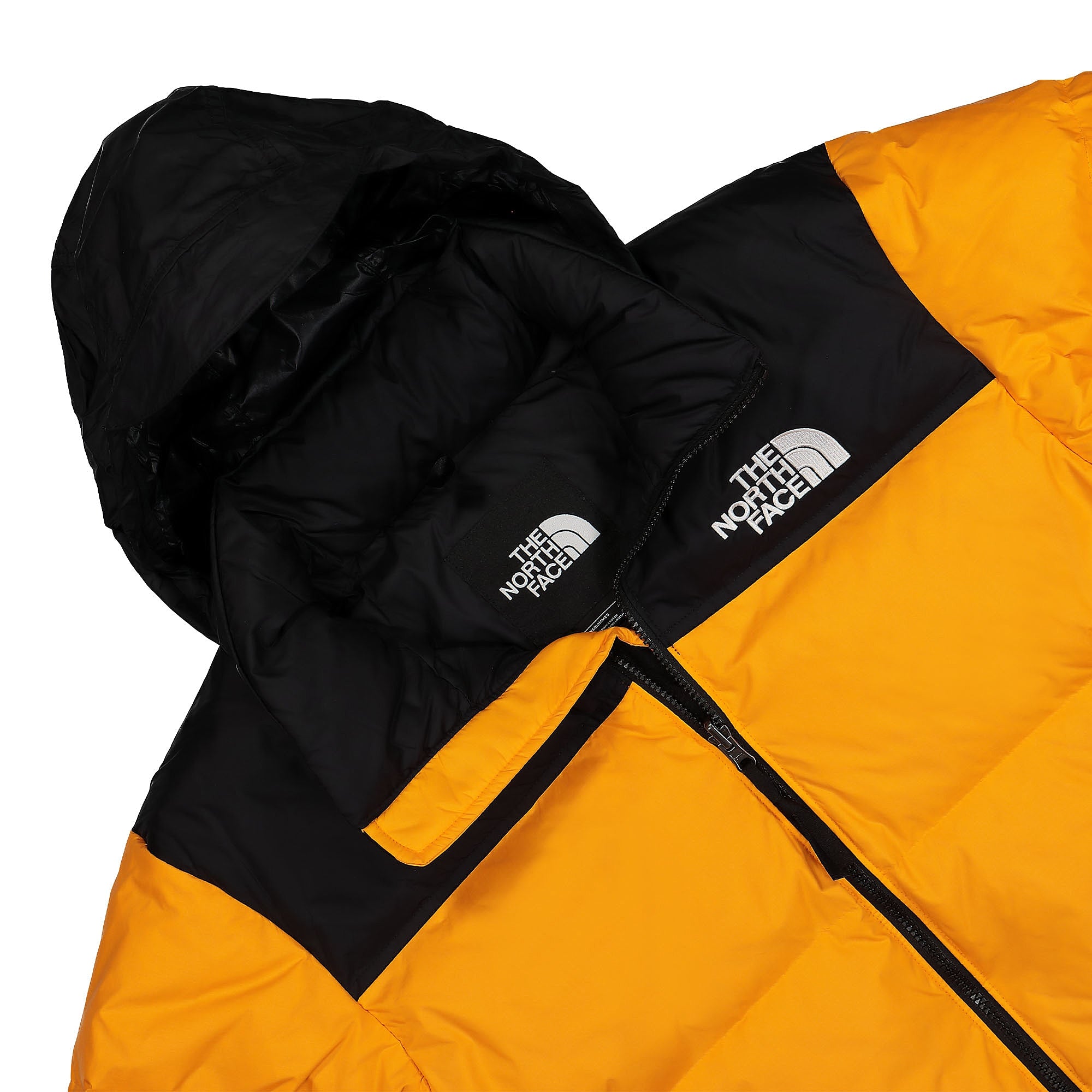 The North Face 1996 Retro Nuptse Down Jacket Cone Orange Puffer Jackets Close-up | Overkill